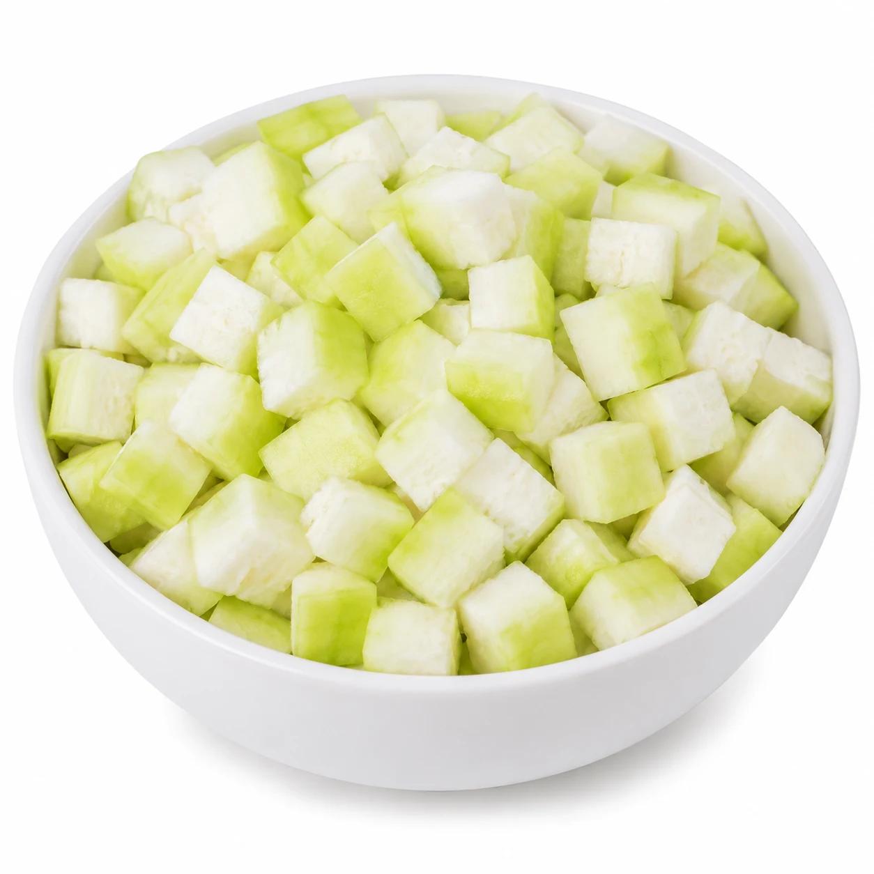 White ceramic bowl filled with freshly diced bottle gourd cubes