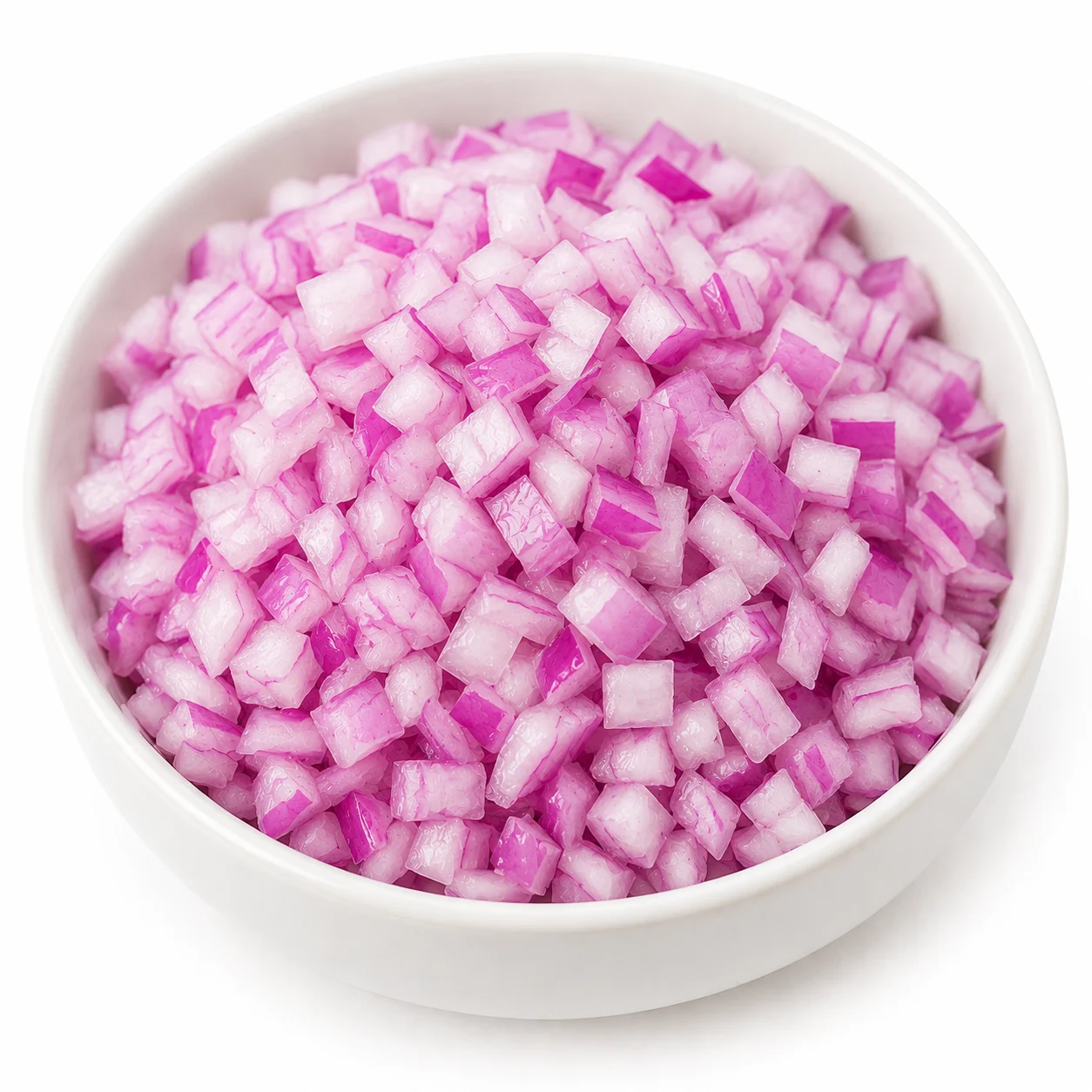White ceramic bowl filled with freshly diced red onion cubes